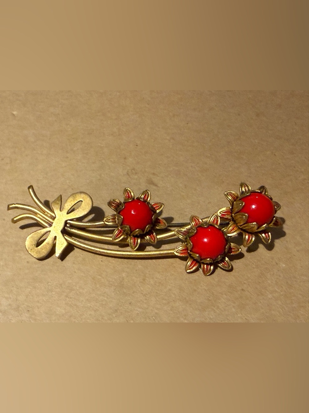 Vintage Gold-Tone Floral Brooch with Red Cabochon Accents